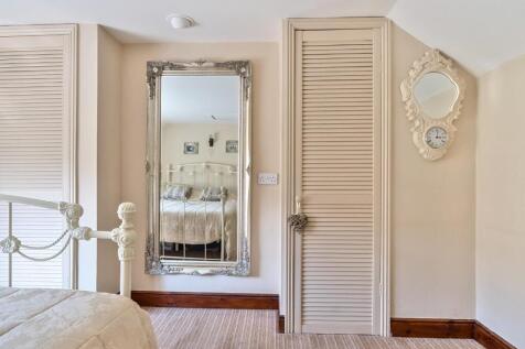 Bedroom 1 wardrobes.jpg