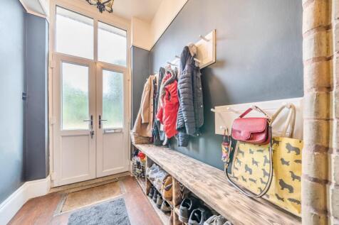 Entrance with seating and coat hooks.jpg