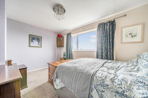 Bedroom 1 with window view.jpg