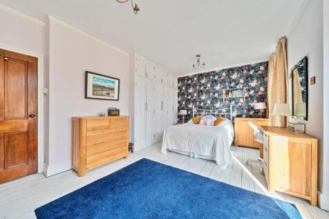 Bedroom 1 with wardrobes.jpg