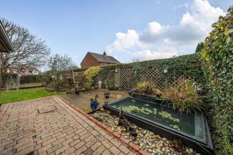 Paved area with pond.jpg