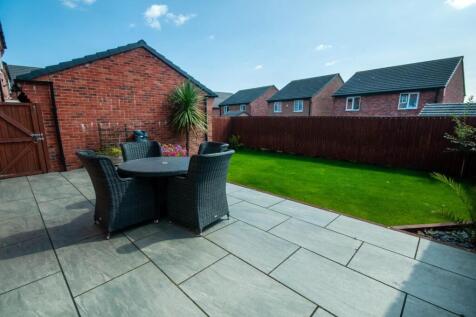 Outside - Professionally Landscaped South Facing R