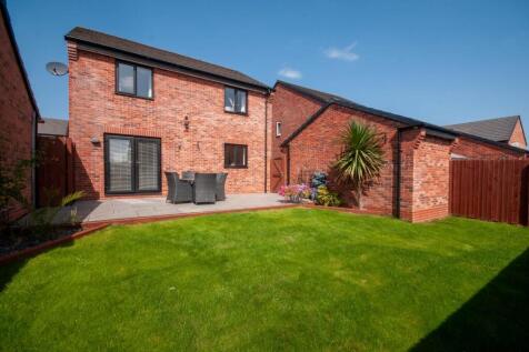Outside - Professionally Landscaped South Facing R