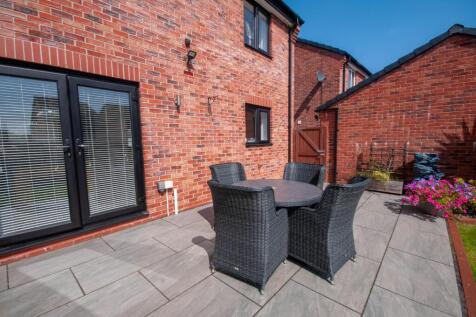 Outside - Professionally Landscaped South Facing R