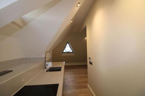 Kitchen looking into lounge