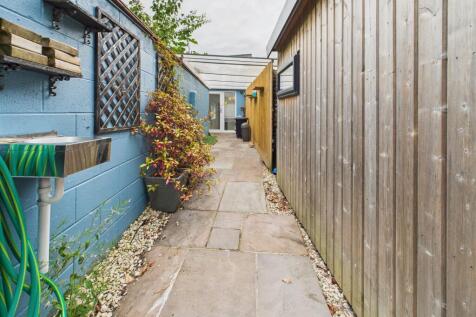 Covered walk way to garden