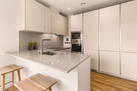 Experience the elegance and functionality of a contemporary kitchen setup.