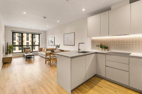 Explore the elegance of this modern open-concept living area, perfect for relaxation and entertaining.