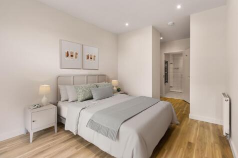 Explore this serene bedroom designed for ultimate relaxation and comfort.