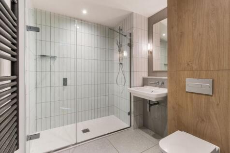 Experience luxury living in this elegantly designed bathroom, featuring contemporary fixtures.