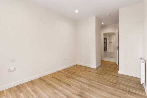Experience open and modern living spaces with elegant wooden floors.