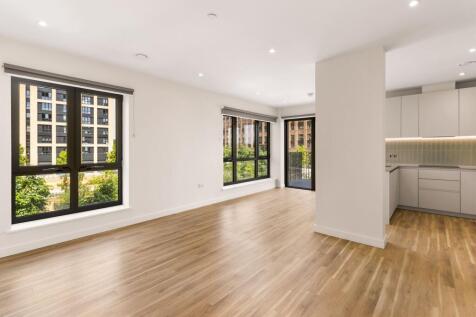 Experience contemporary living in this bright and airy apartment featuring floor-to-ceiling windows.