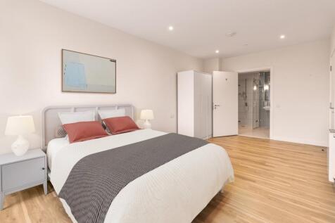 Experience tranquility in this elegant bedroom retreat with modern amenities.