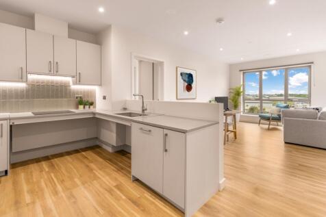 Experience the elegance of this sleek open-concept space, perfect for modern living.