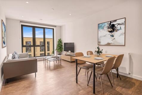 Experience the elegance and comfort of this chic living and dining area.