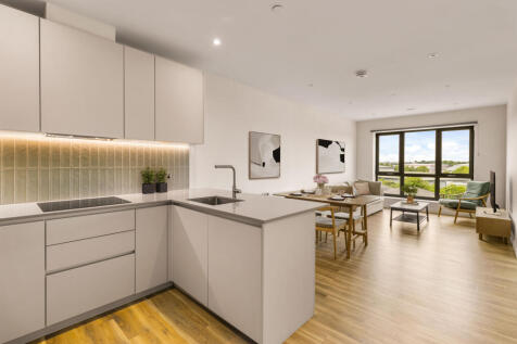 Experience elegance in this contemporary open-plan living space, bathed in natural light.