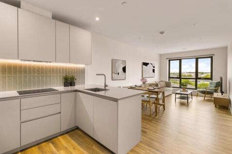 Experience elegance in this contemporary open-plan living space, bathed in natural light.