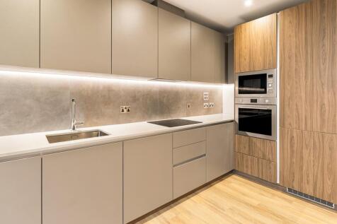 Step into a kitchen that combines elegance with modern functionality.