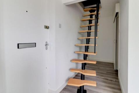 Stairs rising to Loft Room