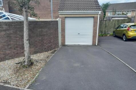 Detached garage to rear with parking