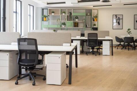 44-46 Sekforde St - desks with green feature wal