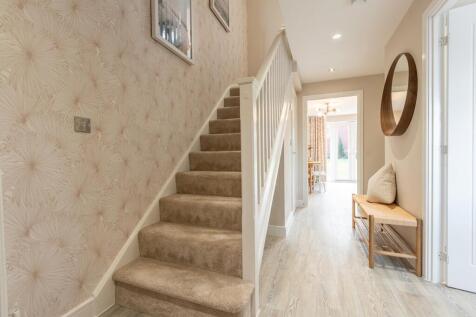 Entrance hallway with under stairs storage