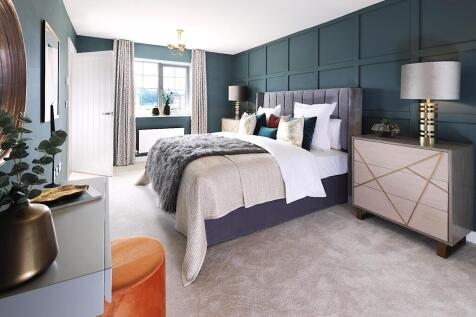 Large windows keep the main bedroom light