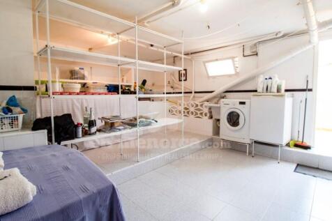 Laundry and storage area Villa Santa Ana