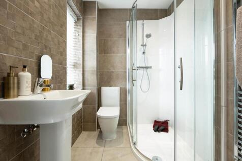 An en-suite from the main bedroom creates a private place away from the rest of the home