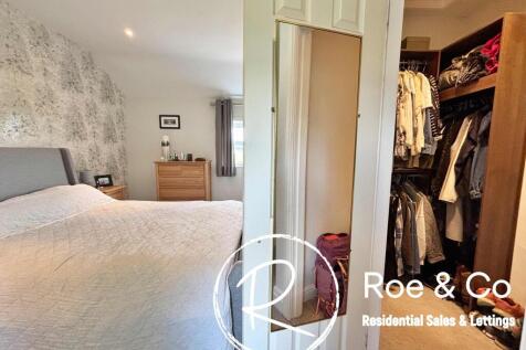 Bedroom one walk in wardrobe