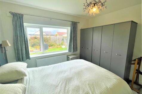 Bedroom with wardrobes.jpg