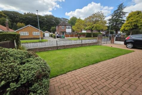 Front Garden to Driveway