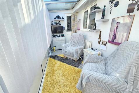 Conservatory leading to garage.jpg