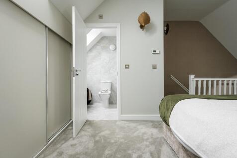 The master bedroom features an en suite &amp; built in storage