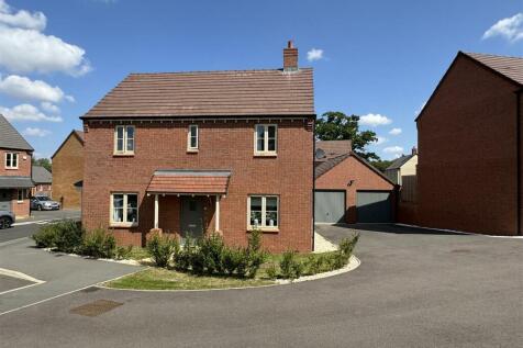 FRONT ASPECT WITH DOUBLE GARAGES