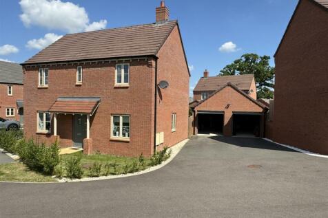 HOUSE SHOWING GARAGE OPEN A.JPG