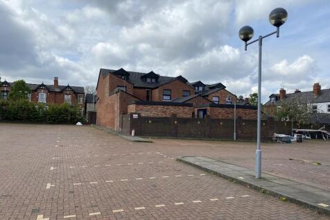Vacant land/car park