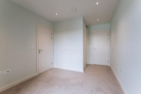 Experience the simplicity and elegance of modern interior design in this spacious hallway.