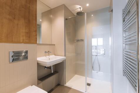 Experience luxury and style in this contemporary bathroom setup.