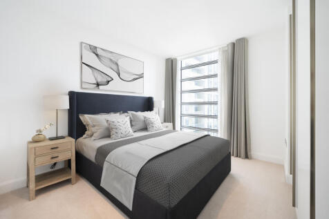 Experience the serenity of this chic urban bedroom, designed for restful nights.