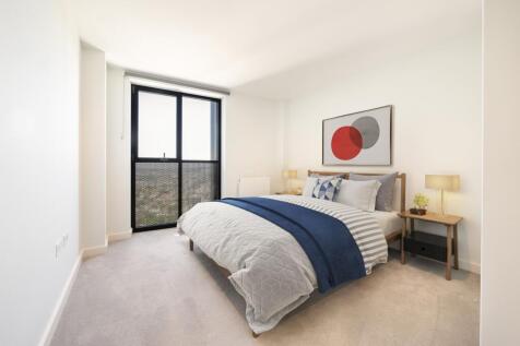 Experience tranquility in this elegantly designed bedroom with contemporary touches.