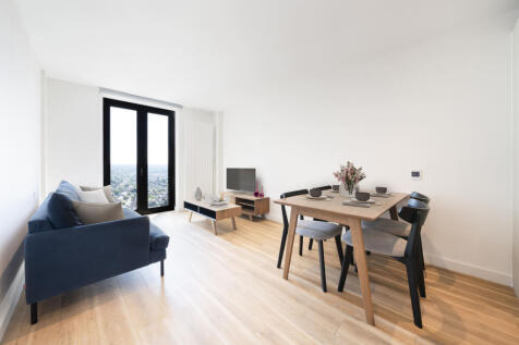 Experience the elegance of contemporary design in this bright, open-concept living and dining space.