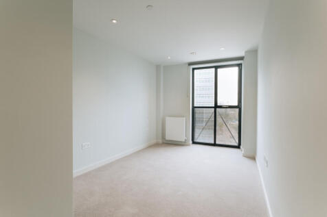 Embrace the simplicity and elegance of this bright, sunlit room.