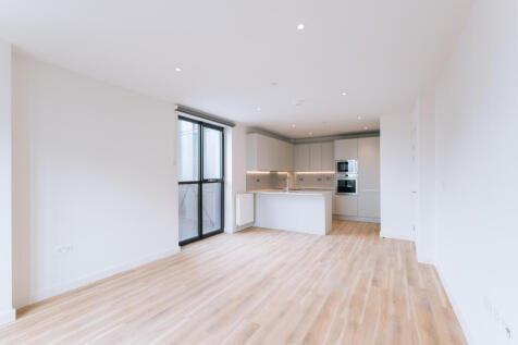 Step into elegance with this stylish kitchen featuring ample space and contemporary design.