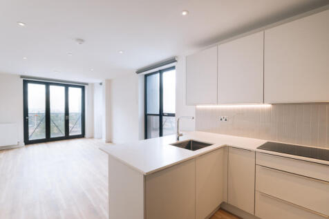 Experience the elegance of this open-plan kitchen and living space, designed for contemporary living.