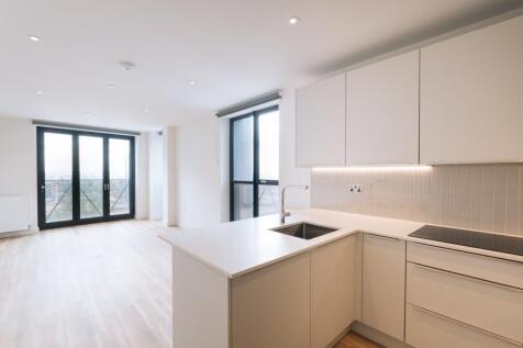 Experience the elegance of this open-plan kitchen and living space, designed for contemporary living.