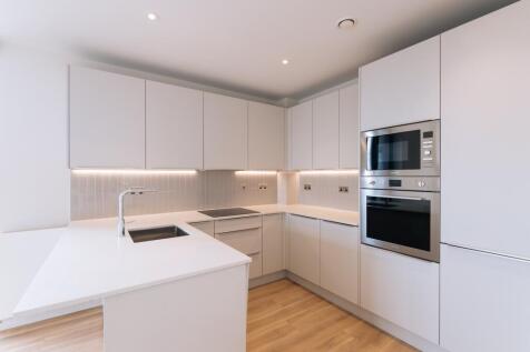 Explore this modern kitchen space that blends style and functionality effortlessly.