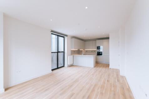 Step into elegance with this stylish kitchen featuring ample space and contemporary design.