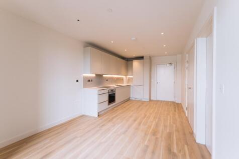 Experience modern elegance with this open-plan kitchen, perfect for culinary creativity.