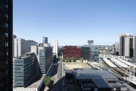 Experience breathtaking urban views from this contemporary high-rise location.